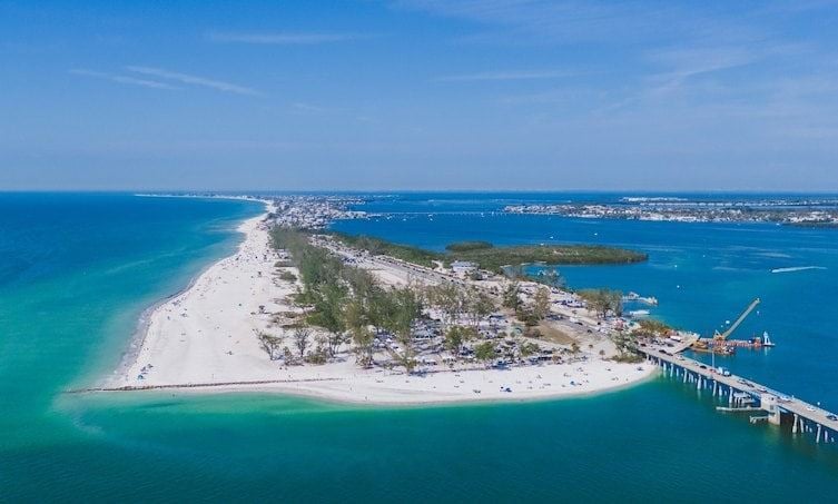 An island with trees and people on it